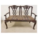 1156	EXCEPTIONAL ROSEWOOD CARVED SETTEE, HAS HANDS CARVED AT THE END OF THE ARMS, BALL & CLAW FEET, 