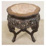 1173	CARVED ASIAN STAND W/INSET BROWN MARBLE TOP, 20 IN DIAMETER X 18 3/4 IN HIGH
