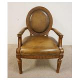 1191	CARVED MEDALLION BACK LEATHER ARM CHAIR, 27 IN WIDE X 41 IN HIGH