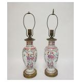 1201	PAIR OF HAND PAINTED ASIAN VASES MOUNTED AS LAMPS, ONE HAS A HAIRLINE DOWN FROM THE TOP PORCELA