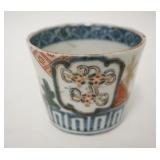 1298	HAND PAINTED ASIAN CUP, HAS A TIGHT HAIRLINE DOWN FROM THE RIM