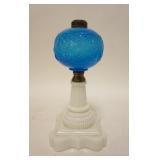 1303	ANTIQUE BLUE KEROSENE LAMP, BERRY PATTERN, HAS FLINT MILK GLASS BASE, HAS INTERNAL SPIDER CRACK
