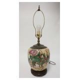 1320	ASIAN URN MOUNTED AS A LAMP, DEPICTS A PROCESSION, CARVED WOODEN BASE, 25 1/4 IN HIGH