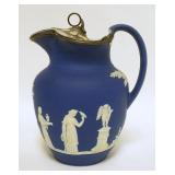 1017	WEDGWOOD ONLY DARK BLUE JASPERWARE PITCHER, HAS WEIGHTED METAL LID, HAS RECEIPT OF PURCHASE IN 