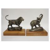 1044	PAIR OF BOOKENDS, LION & ELEPHANT, METAL ON WOODEN BASES, TALLEST IS 8 1/4 IN