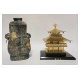 1097	2 PIECE ASIAN METAL IRON COVERED URN & A PAGODA STRUCTURE, TALLEST IS 9 1/2 IN