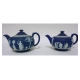 1119	2 WEDGWOOD JASPERWARE TEAPOTS MADE IN ENGLAND, BOTH HAVE FITTER RIM CHIPS, ONE HAS A CHIP ON TH