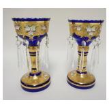 1127	PAIR OF COBALT BLUE W/GOLD GLASS LUSTERS, APPLIED PORCELAIN FLOWERS & PRISMS