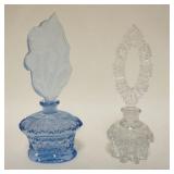1132	2 PERFUME BOTTLES, BLUE BOTTLE IS MARKED MADE IN CZECHSLOVAKIA & HAS THE DABBER STILL ATTACHED 