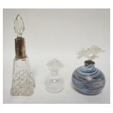 1133	3 PERFUME BOTTLES, ONE IS CUT W/AN ENGLISH STERLING SILVER COLLAR, CHIP ON THE STOPPER, 7 1/2 I