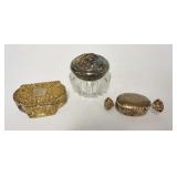 1134	3 SMALL DRESSER BOXES, 2 ARE SILVER, ORNATE BOX IS MARKED #900, WRAPPED CANDY SHAED BOX MARKED 