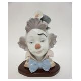 1146	LLADRO CLOWN BUST, COMES W/WOODEN BASE, 9 IN HIGH