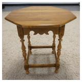 1206	ETHAN ALLEN OCTAGONAL STRECTHER BASE TABLE CUT OUT SKIRT, TURNED LEGS & FEET, TOP IS 24 IN, 26 