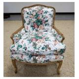 1217	FLORAL UPHOLSTERED ARMCHAIR W/ WOOD FRAME