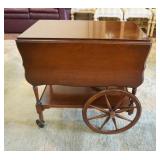 1227	IMPERIAL MAHOGANY TEA CART HAS A PULL OUT GLASS TRAY & ONE DRAWER, 28 1/2 IN X 18 1/2 IN CLOSED