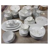 1269	94 PIECE ROSENTHAL WHITE ROSE DINNERWARE SET, LARGEST PLATTER IS 15 1/2 IN, COFFEE POT IS 9 1/2