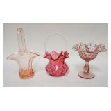 1307	3 PIECE GLASS LOT, FENTON COMPOTE, CRANBERRY BASKET W/TWIST HANDLE & PINK BASKET, TALLEST IS 9 