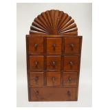 1025	10 DRAWER SPICE CABINET W/ A FAN CARVED CREST, 18 IN W, 32 1/2 IN H, 6 IN DEEP
