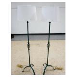 1037	PAIR OF IRON FLOOR LAMPS W/ AN OPEN TWIST DESIGN IN THE CENTER OF THE STEM. 58 IN H 