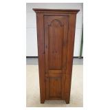 1040	2 DOOR CHIMNEY CUPBOARD W/ RAISED PANEL DOORS. HAS INTERIOR SHELVES W/ PLATE GROOVES. 25 IN W, 