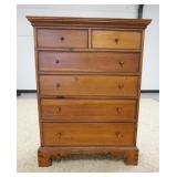 1041	6 DRAWER HIGH CHEST W/ DOVETAILED FEET & CUT OUT SKIRT. 35 IN W, 46 1/2 IN H, 18 1/2 IN DEEP. 