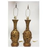 1110	PAIR OF TALL BRASS LAMPS W/OPEN LEAF DESIGN & RELIEF FLOWERS, WOODEN BASES, ONE HAS CORD CUT OF