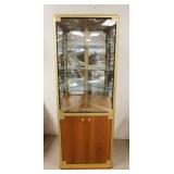 1127	LIGHTED MODERN CORNER CABINET W/MIRROR BACK & GLASS SHELVES, 73 1/2 IN HIGH X 27 IN WIDE