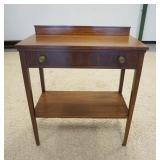 1146	MAHOGANY ONE DRAWER SERVER W/BRASS PULLS, HAS STRING INLAY, SCRATCH IN THE TOP SURFACE, 34 IN W