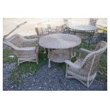 1164	WICKER TABLE & 3 CHAIRS, TABLE DIAMETER IS 42 IN