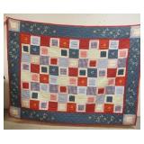 1215	HAND SEWN PATCHWORK QUILT, HAS A PRINT BACK 88 IN X 69 1/2 IN 