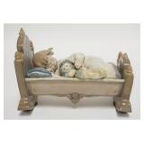 1237	LLADRO GIRL W/ DOLL IN CRADLE 6 1/2 IN L