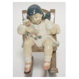 1239	LLADRO GIRL W/ DOLL IN ROCKING CHAIR 5 IN H 