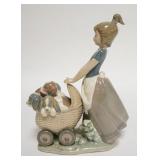 1242	LLADRO GIRL W/ CARRIAGE OF PUPPIES 8 3/4 IN H 