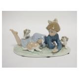 1254	LLADRO RECLINING, 6 3/4 IN WIDE X 4 1/4 IN HIGH