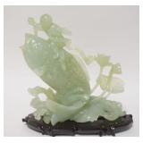 1311	ASIAN SCULPTURE MAN ON A FISH, WOODEN BASE, 9 1/4 IN WIDE X 9 3/4 IN HIGH