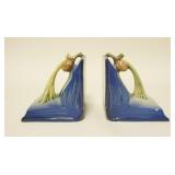 1015	PAIR OF ROSEVILLE BLUE PINECONE BOOKENDS. ONE BOOKEND HAS TWO SMALL FLAKES. 4 3/4 IN H 5 1/2 IN