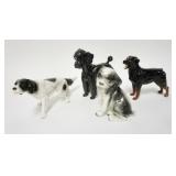 1057	LOT OF FOUR DOG FIGURES, INCLUDING; ROYAL DOULTON, ERPHILA, GOLDSHEIDER & GEOBEL. LARGEST IS 6 