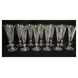 1077	SET OF 12 WILLIAM YEOWARD CUT CHAMPAGNE FLUTES. 8 3/8 IN H 