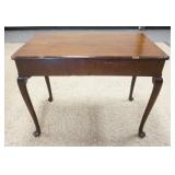 1135	ANTQUE CABRIOLE LEG TABLE HAS DRAWER ON EITHER SIDE, NEEDS RESTORATION, 37 IN W, 28 IN H 21 IN 