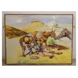 1165	12 HAND PAINTED TILES BY CERAMICS STA ANA SEVILLA FRAMED. TILES FORM A SCENE OF DON QUIXOTE & S