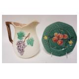1194	MAJOLICA PITCHER & PLATE. PITCHER HAS A SPIDER IN THE BASE, PLATE IS GERMAN & HAS A RIM CHIP & 