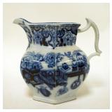 1211	BLUE DECORATED IRONESTONE PITCHER, ASIAN MOTIF, 7 1/2 IN HIGH