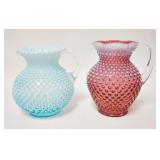 1264	FENTON HOBNAIL PITCHERS, CRANBERRY & BLUE OPALESCENT. TALLEST IS 8 1/2 IN 