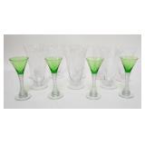 1267	GLASS LOT INCLUDES 8 ELEGANT ETCHED TUMBERS & 4 GREEN & CLEAR WINES. TALLEST ARE 5 7/8 IN 