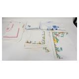 1282	LINEN LOT MIERIBEAUVILLE, FRANCE TABLECLOTH & 12 NAPKINS W/ ASIAN DESIGN. TABLECLOTH IS 65 IN X