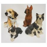 1302	LOT OF FOUR DOG FIGURES ONE IS A COOKIE JAR TWO ARE SANDCAST. TALLEST IS 13 1/4 IN 