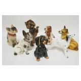 1306	SEVEN DOG FIGURES TALLEST IS 8 1/4 IN 