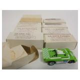 1030	LOT OF 10 SLOTCARS TCR JAM CARS IN BOXES