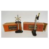 1194	LIONEL O GAUGE #154 & 151 CROSING SIGNAL & SEMAPHORE