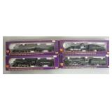 1310	LOT OF 4 IHC PREMIER SERIES MODEL TRAINS
